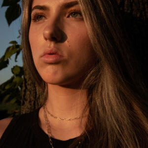 photo Portrait in the Park - Taken of my girlfriend a she leaned on a tree near the swing on the hill next to the Visitors Center Parking Lot on July 19, 2022 by Tyler Woodruff
