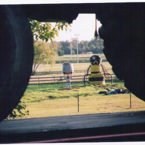 photo John Deere tractor framing the Corn Cannon targets at the Fall Harvest Festival - Taken on October 9, 2010 by Debbie Bohdal