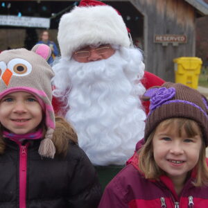 photo Cousins Visit Santa - taken in December by Lori Sexton