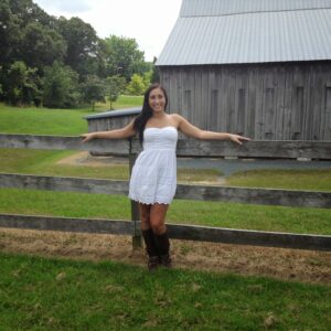 photo Woman  by  Fence  2 - Taken  on  August  8,  2013 by Ellie  Cerasuolo