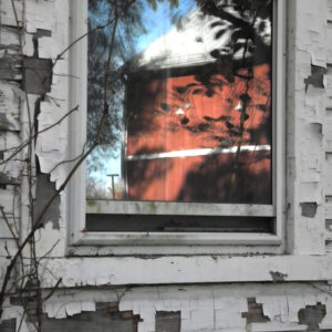 photo New and Old Buildings - Taken of the Visitor Center reflected in the old farmhouse window on November 10, 2016 by Mark Laster