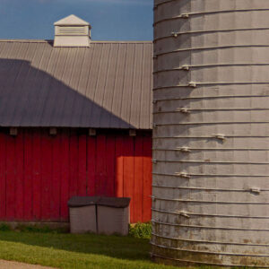 photo Momentary View at KFP - Taken Facing East toward Large Animal Barn, with Silos at the right, and Farmhouse on the left on August 5, 2020 by Mark Laster