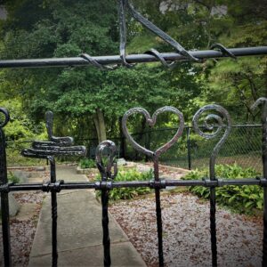 photo If This Gate Could Talk - Artist Ironwork - Taken at the Kinder Cemetery on August 14, 2021 by Sandra Gendleman