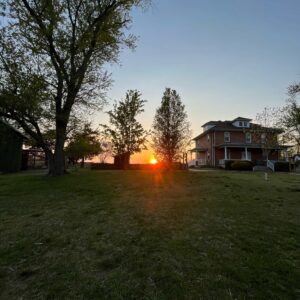 photo Fire in the Sky - Taken at sunset looking west toward the Kinder Farmhouse on April 23, 2022 by Elizabeth Hoy