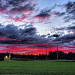 photo Red Sky at Night, Sailor’s Delight - Taken of a colorful surprise ending to a gray afternoon in September 2022 by Adam Pegues