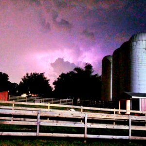 photo Friday Night Lights - Taken from the road by the athletic complex during a lighting storm on September 8, 2023 by Adam Pegues