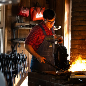 photo Forged in Fire: The Blacksmith's Glow - Taken at the Blacksmith Shop on October 12, 2024. by Kurt DeLorenzo