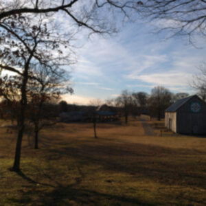 photo Sunset on a Hill - Taken in December from the swing on to the hill next to the Visitors Center. by Camden Steelman