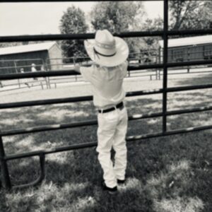 photo Cowboy Dreams - Taken August 17, 2025, while prepping for Luke's first livestock fair show at Kinder Farm. He won first place and reserve champion in dairy goats that day! by Alyssa Stoffel